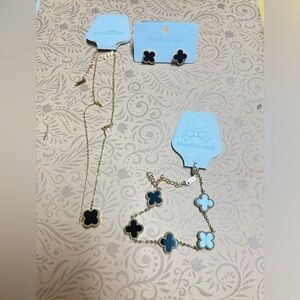 Set of Cloverleaf necklace, earrings and bracelet